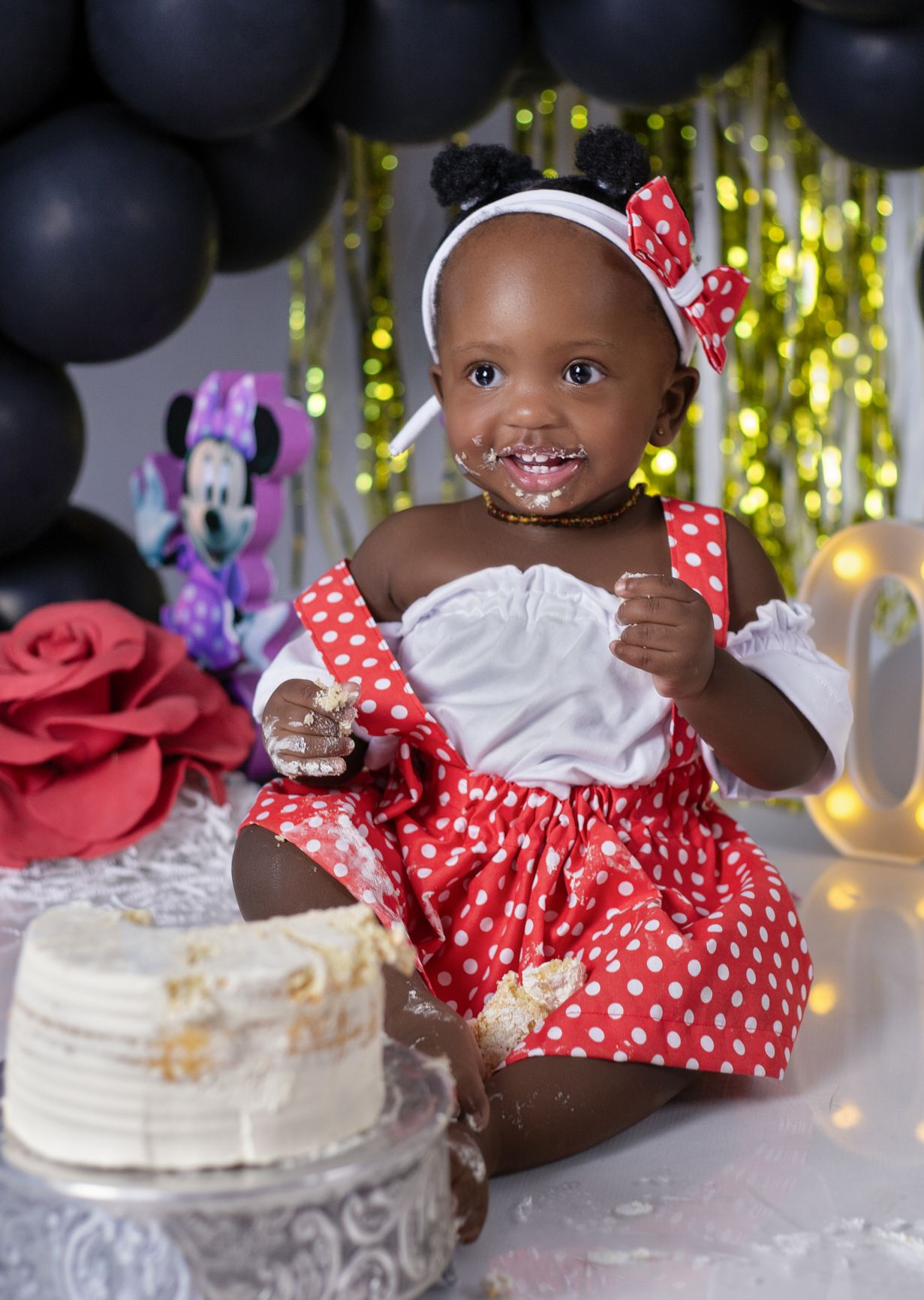 baby with birthday cake